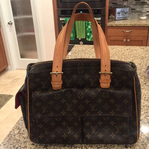 louis vuitton purse with side pockets